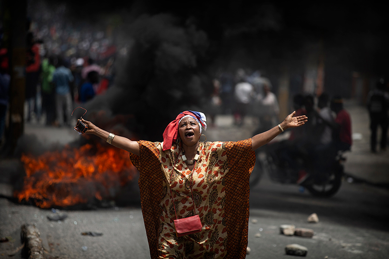 A protester in Port-au-Prince, Haiti, on June 9, 2019. Photo: Dieu Nalio Chery, winner of the 2019 Robert Capa Gold Medal Award.